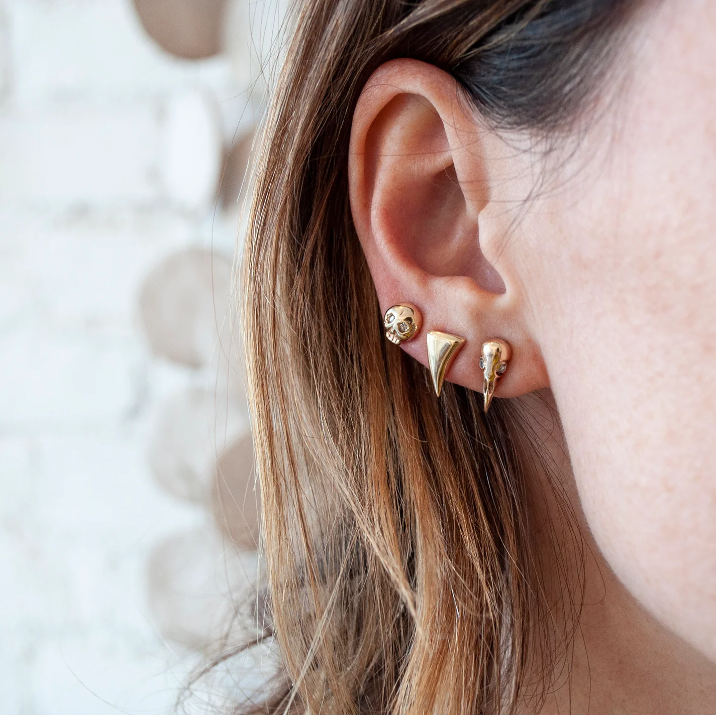 Gold Diamond Eye Skull Studs - Image 2